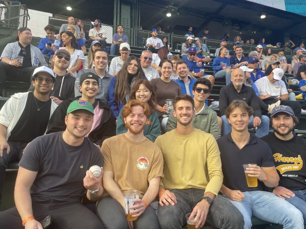 the Clarity team in the bleachers during a Cubs game