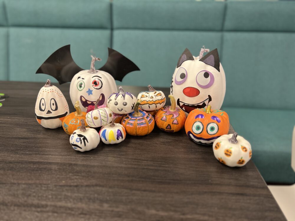 Pumpkins painted by the Clarity team as part of a fall-themed Wine and Cheese celebration