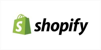 Shopify logo featuring a green shopping bag with a white S on it, next to the word shopify in bold black letters on a white background—perfect branding for modern website design.